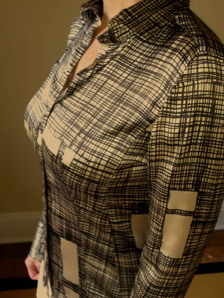 Button-up shirt lying flat after using PINX